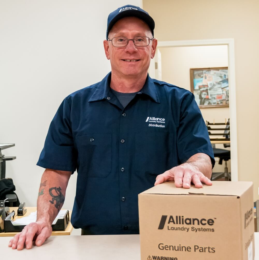 alliance employee with box